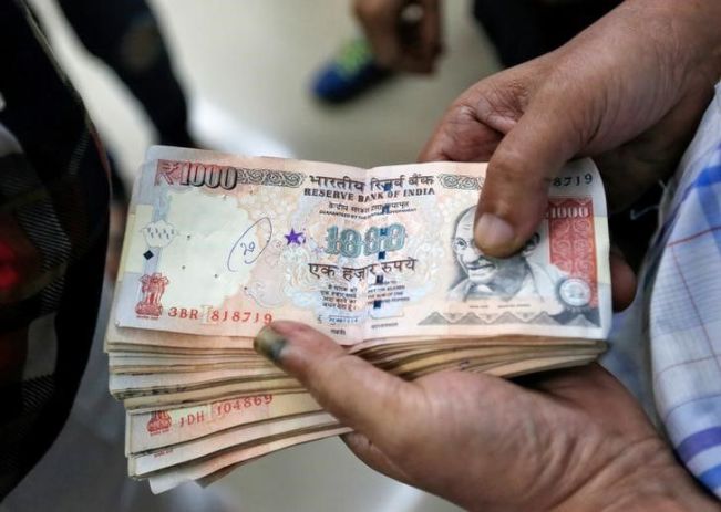 1,000 rupee banknotes – worth 700 rupees each today, available from the newest entrants into the money-changer business. Unfortunately, their business model is fraudulent; it sure seems a strange way to “fight corruption”.