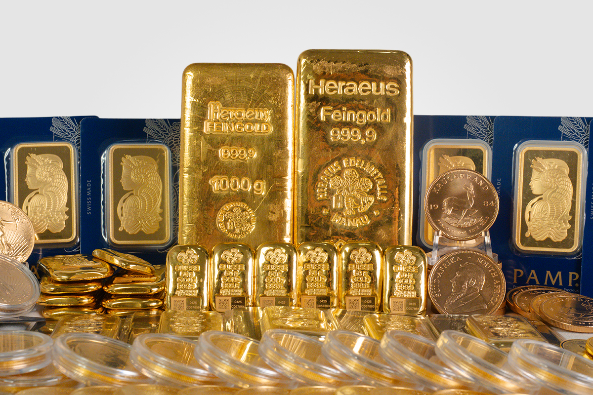 Range of gold bullion including Heraeus kilo bars, PAMP minted bars, Krugerrand coins, and encapsulated gold coins