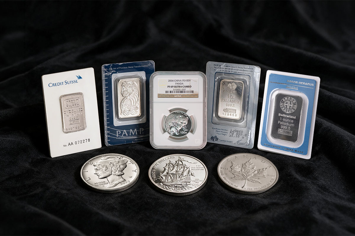 A selection of palladium bars and coins including Argor-Heraeus and PAMP 1 oz palladium bars, a graded NGC palladium Panda coin, a Canadian palladium Maple Leaf coin, and other bars and coins displayed on a dark velvet surface