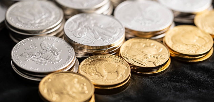 Gold Buffalo and Silver Eagle coins.